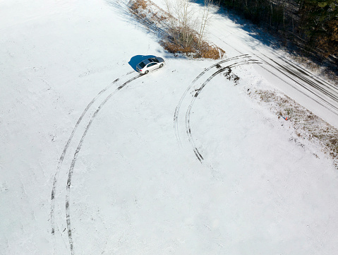 aerial view of tire tracks on snow