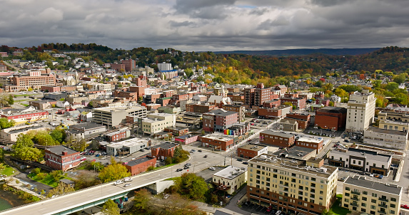 Aerial still of Morgantown, West Virginia, on an overcast day in Fall.\n\nAuthorization was obtained from the FAA for this operation in restricted airspace.