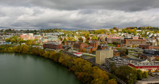 istock Monongahela River Alongside Morgantown, West Virginia on Cloudy, Fall Day - Aerial Still 1893891789