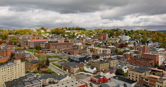 Aerial still of Morgantown, West Virginia, on an overcast day in Fall.\n\nAuthorization was obtained from the FAA for this operation in restricted airspace.