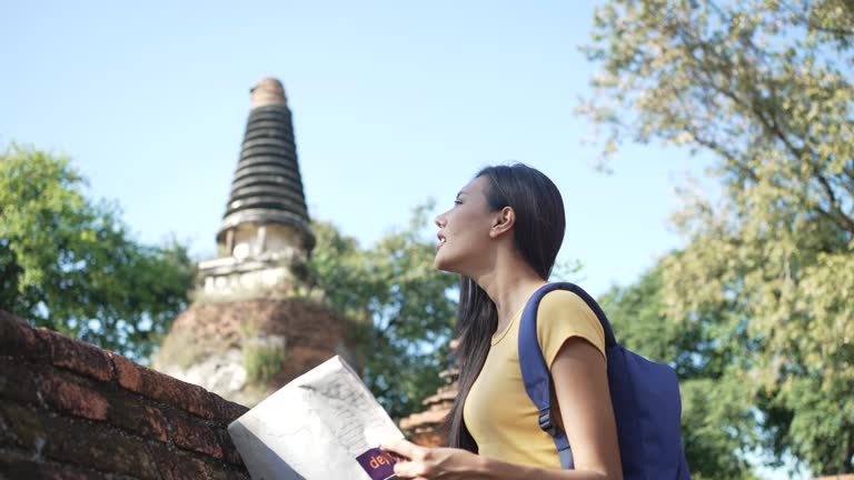 Backpacker woman travel at Ayuthaya province, Thailand.