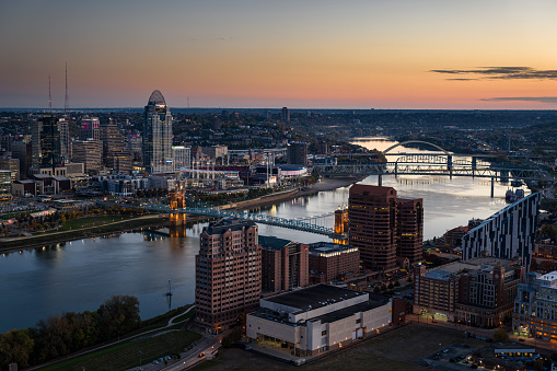 Aerial view of Downtown Cincinnati, Ohio and Covington, Kentucky before sunrise on a Fall morning.
