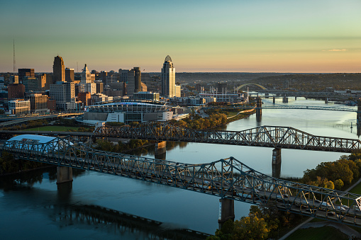 Aerial view of Downtown Cincinnati, Ohio and Ohio River before sunrise on a Fall morning.
