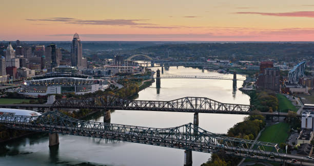 istock Ohio River Flowing between Cincinnati and Covington, Kentucky at Dawn in Fall 1893920049