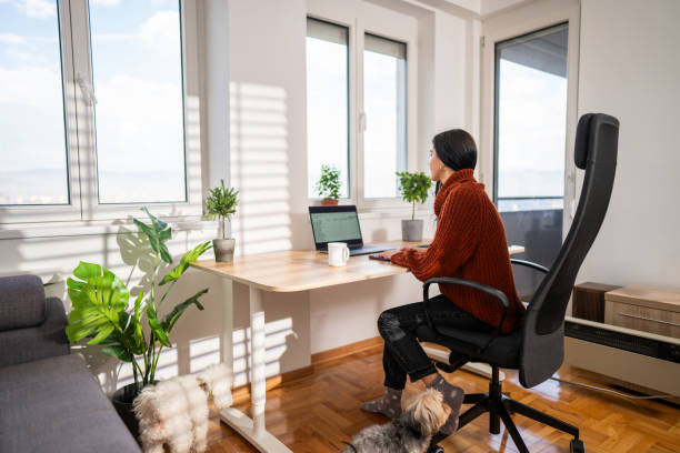 istock Young woman working from home office 1894056377