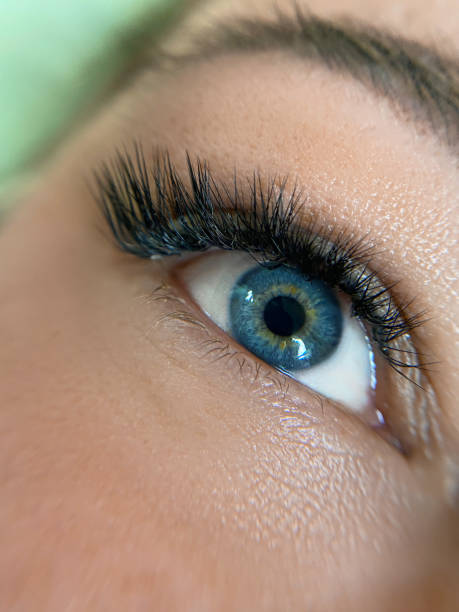 istock permanent make up , close up woman eye with perfect lashes beautiful 1894067719