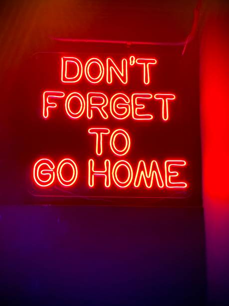 istock LED board with sign saying 'don't forget to go home' 1894115463
