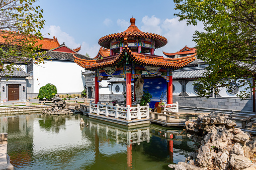 Tourists sightseeing at the Guangji Bridge, an ancient bridge that crosses the Han River east of Chaozhou, Guangdong province, China. The bridge is renowned as one of China's four famous ancient bridges. Chaozhou is a cultural center of the Chaoshan region.