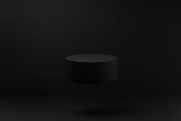 istock Levitate black round podium, mockup on black background with shadow. Template for presentation cosmetic products, gifts, goods, advertising, design, display, showing in rich modern style. 1894186129