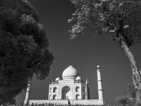 The Taj Mahal is an ivory-white marble mausoleum on the right bank of the river Yamuna in Agra, Uttar Pradesh, India. Shoot on Infrared Black and White Colour at Agra India
