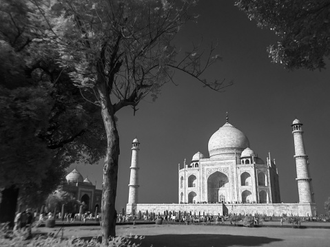 The Taj Mahal is an ivory-white marble mausoleum on the right bank of the river Yamuna in Agra, Uttar Pradesh, India. Shoot on Infrared Black and White Colour at Agra India