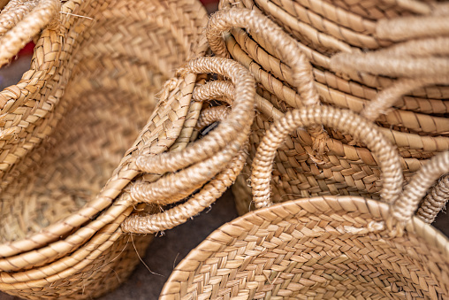 Baskets are handmade and are colored using natural dyes. The designs are ethnic in origin. Handicraft products of Indigenous tribes in Brazil.