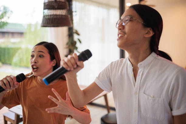 istock A couple's living room karaoke session 1894253804