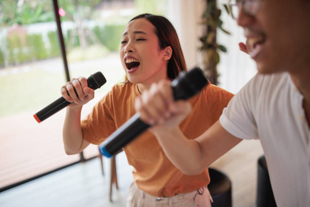 istock A couple's living room karaoke session 1894255744