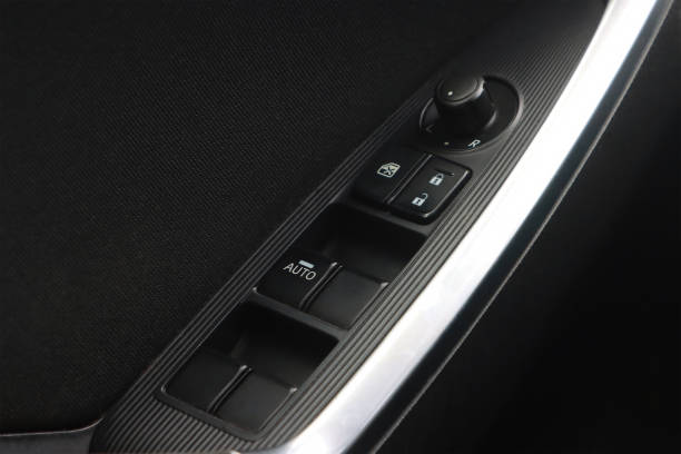 istock controls for locking doors and windows on the doors of a car 1894268644
