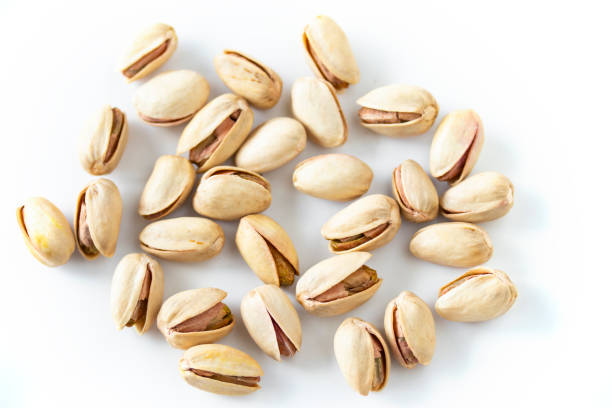 istock shelled pistachios with rock salt. 1894274804