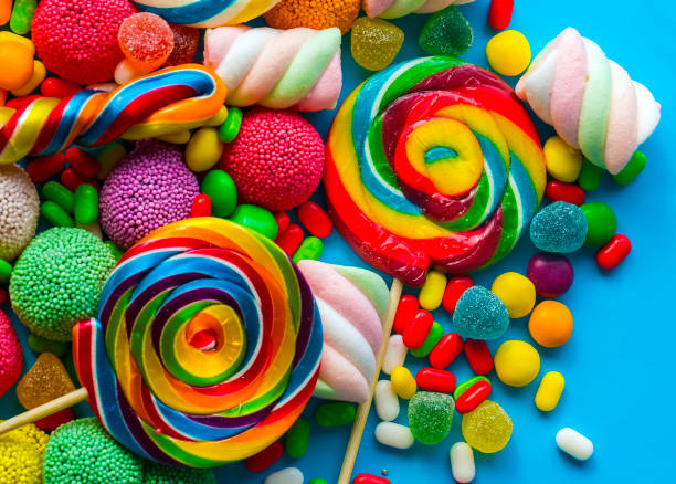 istock Colorful lollipops and different colored round candy. Top view. 1894307853