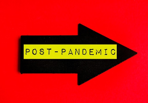 Red arrow with red text written POST-PANDEMIC, means what happening after years of living with COVID-19, how lifestyle business and economy recover and change