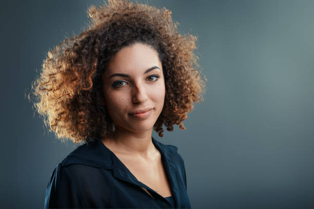 istock Sudden insight sparkles in young Latina's eyes 1894351825