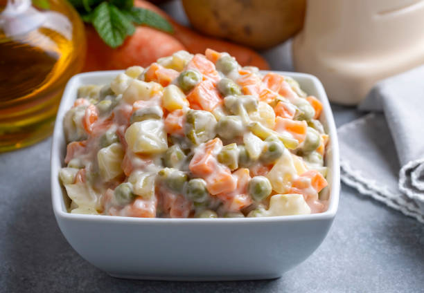 istock Russian salad, Olivier salad with mayonnaise and egg served (Turkish name; Rus salatasi) 1894452442