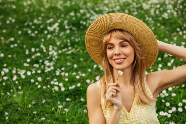 Smiling young woman enjoying summer