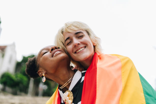 istock Lesbian couple embracing outdoors 1894547242