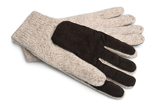 Male woolen knitted gloves on white background