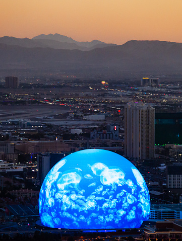 MSG Sphere in Las Vegas at sunset with mountains behind