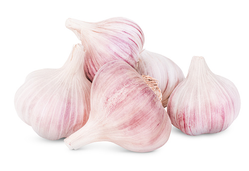 heap of garlic on white isolated background