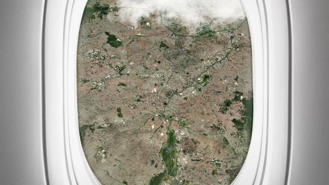 Satellite Sao Paulo map background loop. Airplane salon passenger seat window view. Spinning around Brazil city plane cabin air footage. Seamless panorama flies over terrain backdrop.