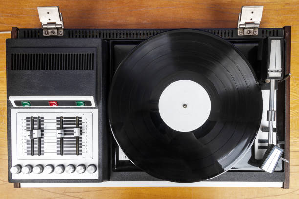 istock Vintage turntable vinyl record player with black vinyl 1894684038