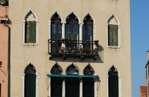 Facade Of A Venetian Building On The Canale Grande In Venice Italy On A Wonderful Spring Day With A Clear Blue Sky