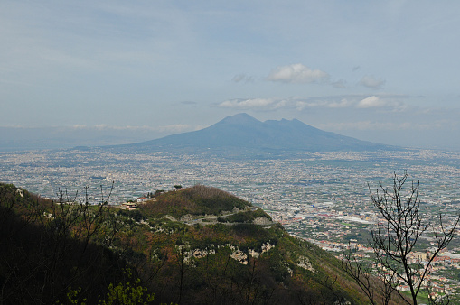 Distant View From Valico Di Chiunzi To Mount Vesuvius In Italy On A Wonderful Spring Day With A Few Clouds In The Sky