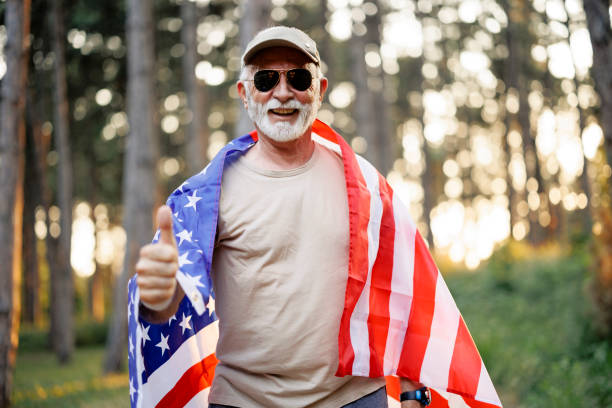 istock Authentic Vietnam Veteran with American Flag 1894701394