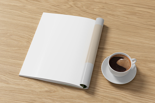 Magazine left-hand page mockup and cup of coffee on wooden desk. 3d illustration