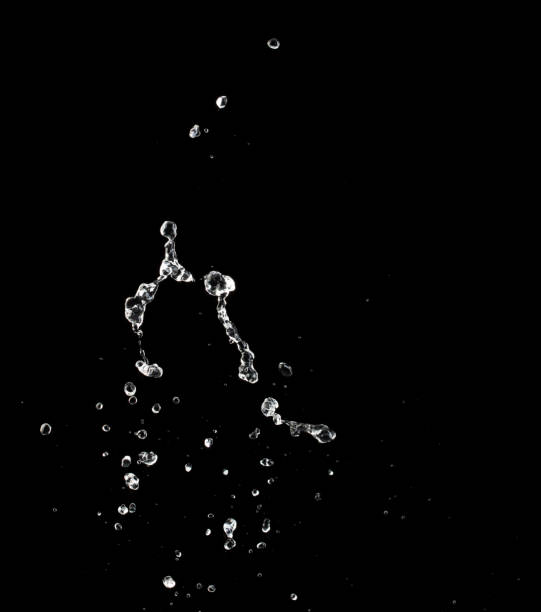 istock Shape form throw of Water splashes into drop water attack fluttering in air and stop motion freeze shot. Splash Water for explosion texture graphic resource elements, black background isolated 1894722661