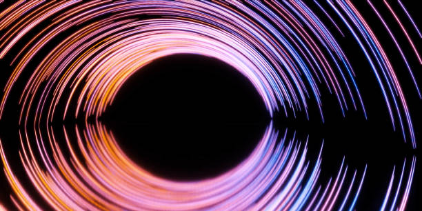 istock Photo of a black hole with vibrant light rays surrounding it 3d render illustration 1894739763