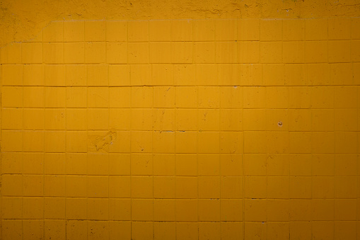 Yellow brick background wall