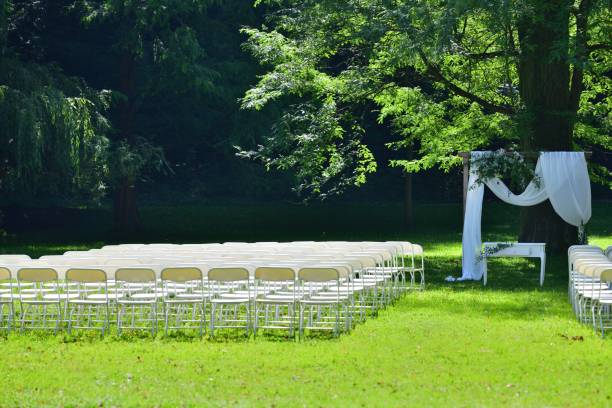 istock White wedding decoration in the forest park before the wedding 1894753449