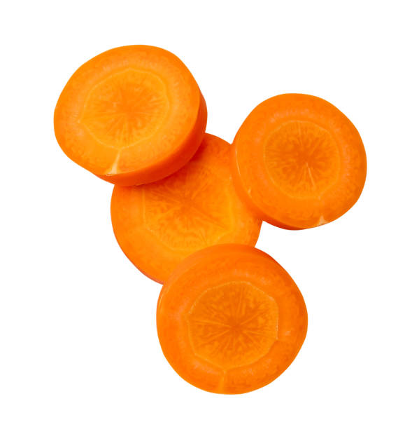 istock Top view of beautiful orange carrot slices in stack isolated on white background with clipping path. 1894755108