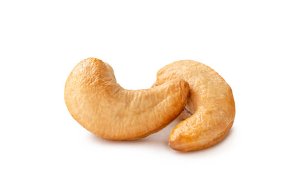 istock Front view of two roasted cashew nut in stack isolated on white background with clipping path 1894755111