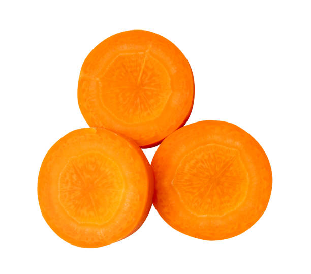 istock Top view of beautiful orange carrot slices in stack isolated on white background with clipping path 1894755304
