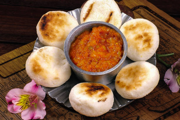 istock White corn arepa with hogao, breakfast, Colombian food. 1894798205
