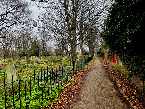 Vinegar Alley going past a cemetery by St Mary's Church Walthamstow. December 2023