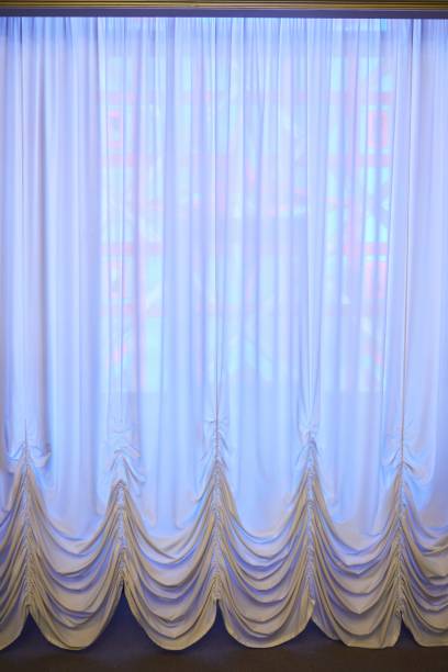 istock Curtains or drapes on the window. Interior decor 1894804427