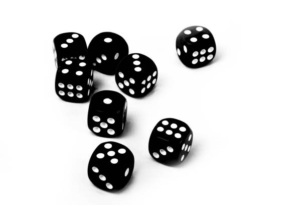 istock close up of black dices isolated on white 1894812294