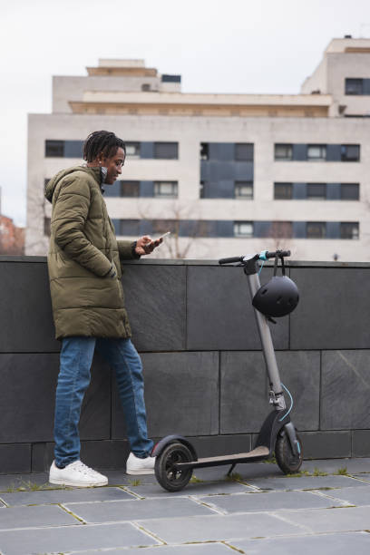 istock Urban ride on an electric scooter. Electrical city mobility. 1894865011