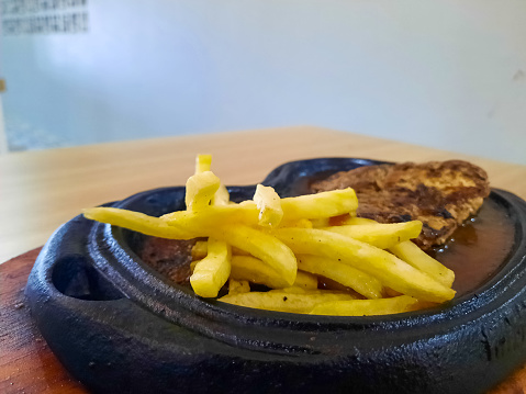 Delicious Chop Fries Beef Steak With French Fries. Food Menu.