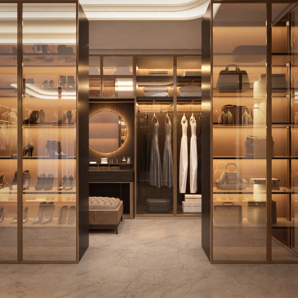 istock Luxury walk in closet interior with wood and gold elements.3d rendering 1894939381