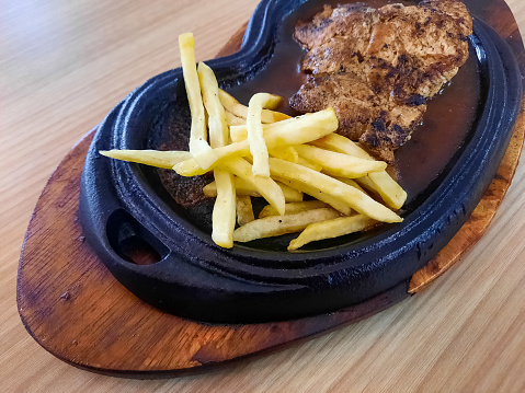 Serving Of Chop Fries Beef Steak With French Fries. Food Menu.